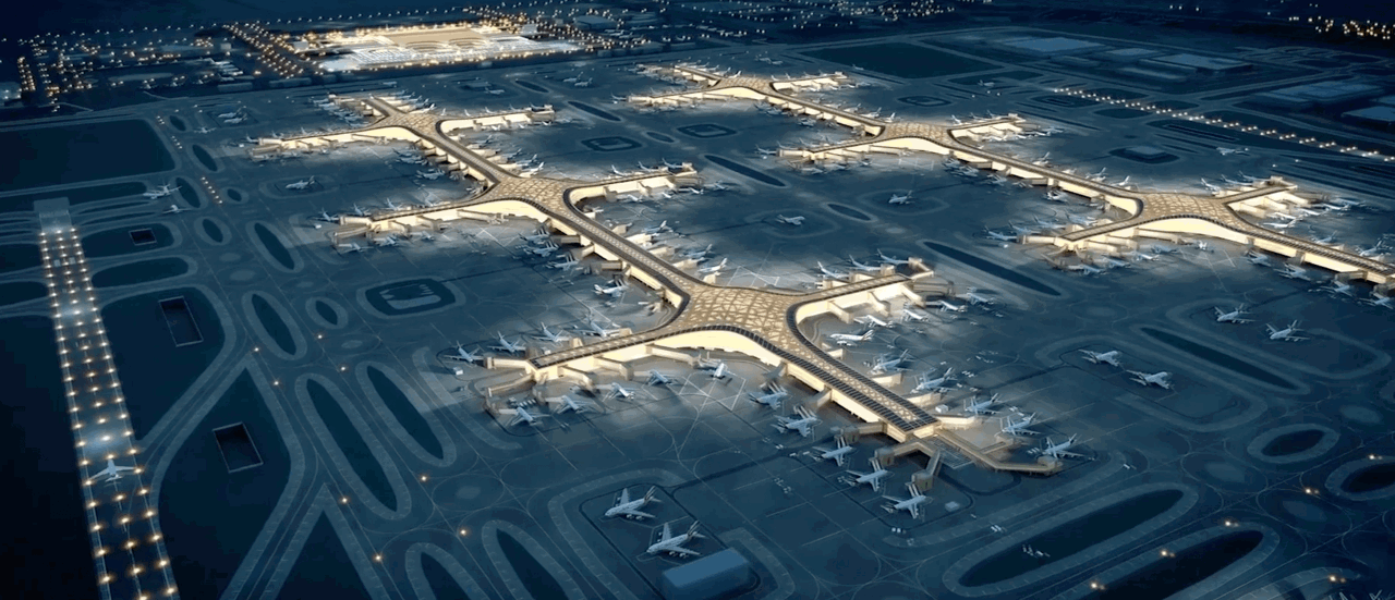 Bird's eye visualisation of two lit-up concourses at DWC by night Bird's eye visualisation of two lit-up concourses at DWC by night