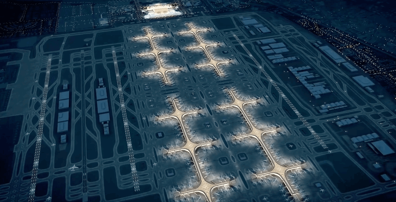 Night-time view of all concourses at DWC and the West Terminal building, lit up. Night-time view of all concourses at DWC and the West Terminal building, lit up.